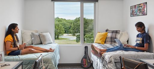 Students in their dorm room in Balsam Hall