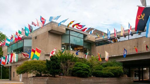 International flags flying outside of the Campus Center