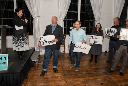 Community members close out the evening by singing 