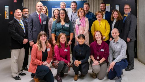 Group photo of MLSC administrators and MLS faculty and staff