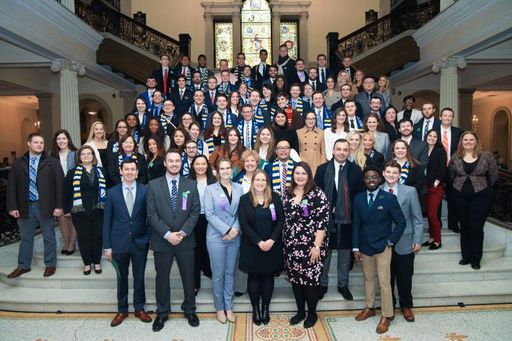 Large group of UMass Law students and faculty