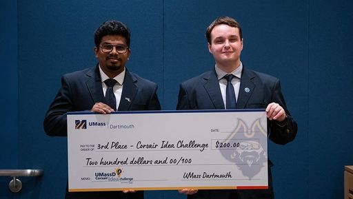 Business students Jeevan Teja Araveti (left) and Joshua Keith (right) take the third-place $200 award.