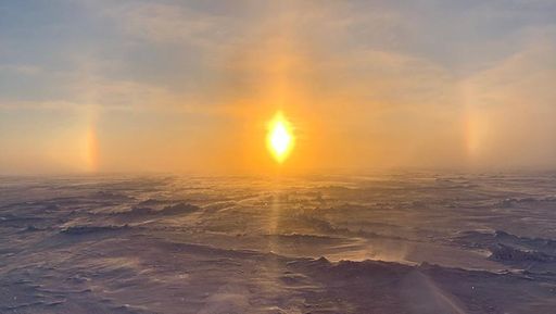 Sun dogs (halos) caused by the refraction of sunlight by ice crystals in the atmosphere. Photo courtesy Marcia Campbell