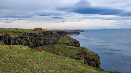 Cliff on the coast of Iceland overlooking the North Atlantic Ocean.