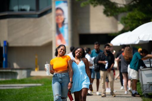 UMassD students walking through the main campus quad