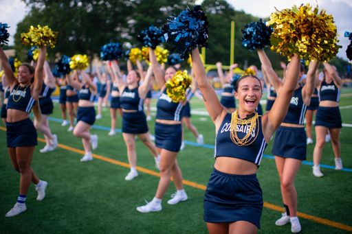 UMass Dartmouth Cheerleading team at the Football team's Gold Rush game.