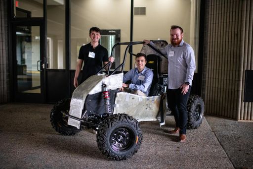 Corsair Racing students pictured with their off-road Baja vehicle