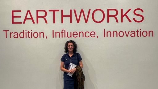 Anis Beigzadeh poses with the exhibition title: 