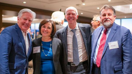 Left to right: UMass President Marty Meehan, UMass Trustee Julie Ramos Gagliardi '87, UMass Dartmouth Chancellor Mark Fuller, and UMassD Executive Director of Economic Development and Community Partnerships Michael Goodman.