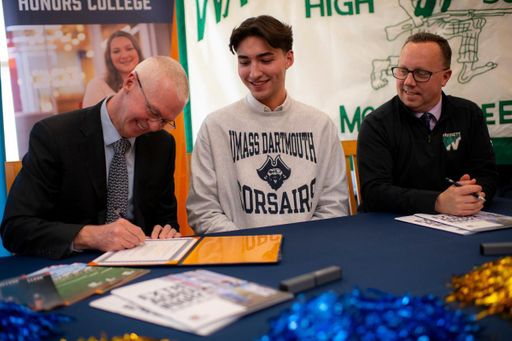 Chancellor Fuller signing Jack Greene's certificate