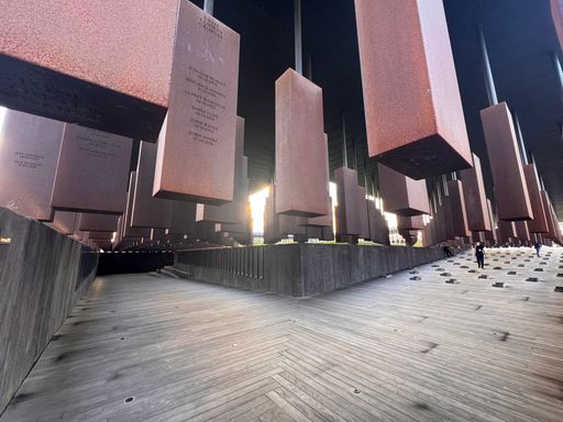 The National Memorial for Peace and Justice in Montgomery, Alabama, features hanging steel monuments engraved with the names of victims of racial terror lynching.