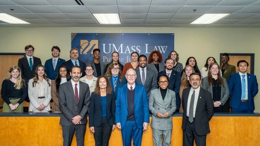 UMass Law students and administrators pose with Federal Circuit Court Judges