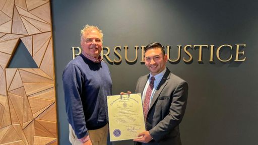 MA Rep. Chris Markey (left) awards citation to 3L Timothy Trocchio