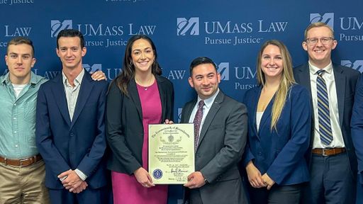 Members of the Student Veteran's Law Association pictured with the citation from Rep. Chris Markey.