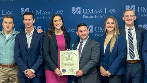 Members of the Student Veteran's Law Association pictured with the citation from Rep. Chris Markey.