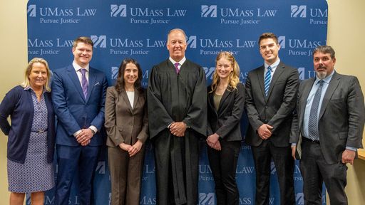 Mock Trial semifinalists pictured with Hon. Joseph P. Harrington, First Justice (center) and their coaches. Photo courtesy Kristina Besse