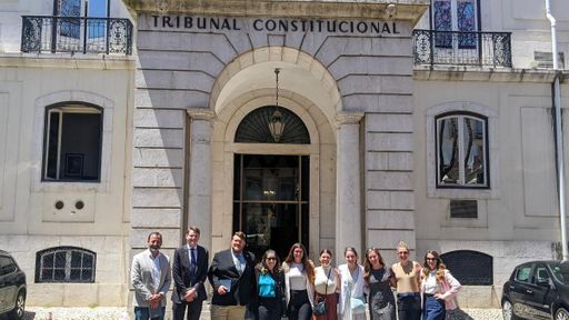 Dean Sam Panarella and UMass Law students pose in front of the Portuguese Constitutional Court in Lisbon.