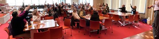 Faculty members participating a session in the library