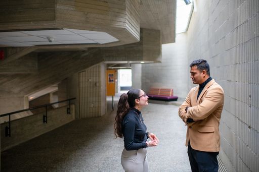 Graduate students talking at UMassD