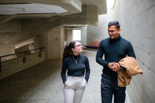 Graduate students talking at UMassD