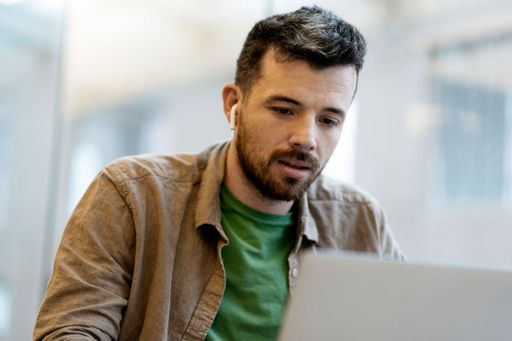 Male student on laptop