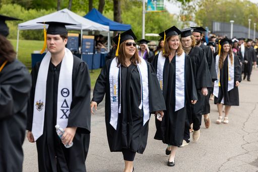 Online students in line at commencement