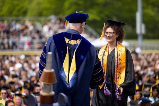 Nursing Student Walking at Commencement