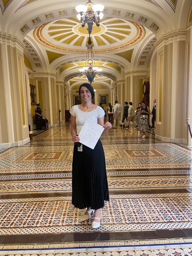 UMassD Alum, Maryana Sawaged ’21, inside Capitol Building