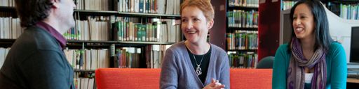 Anna Klobucka working with students in the library