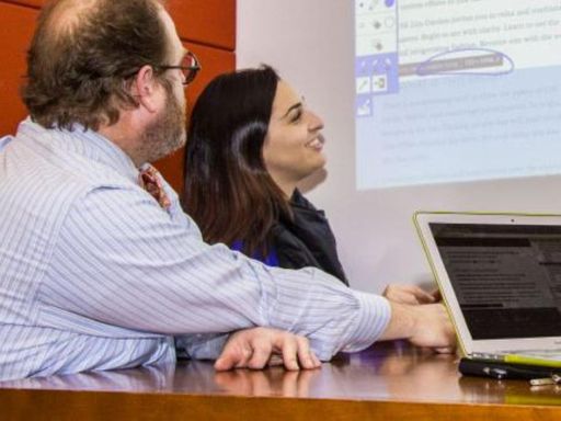 Graduate students attending a Masters in Professional Writing class 