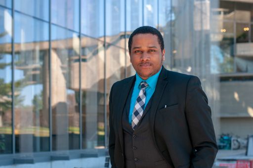 Josue Rivera '19 in front of the library