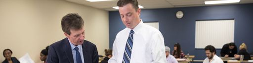 UMass Law faculty and student