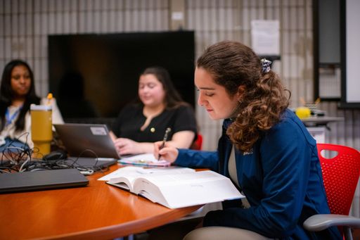 Students studying a textbook