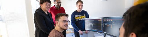 Professor Chan Du with students in the Charlton Technology Center