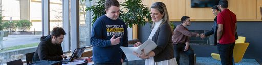 Academic Advisor Angeliki Kouma meeting with Accounting student, Joshua Keith '23, in the CCB Learning Pavilion lounge