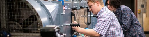 Mechanical engineering senior design students conducting research in the FSI lab