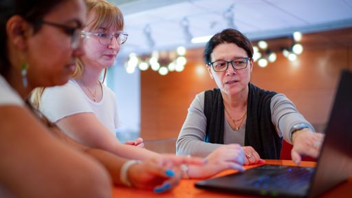 Professor Iren Valova meeting with Computer Science - Software Engineering students Sarah Santiago '23 and Elisa Normand '23