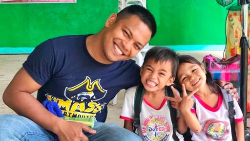 Bhen with his art students at Talibon Elementary School in Bohol, Philippines.