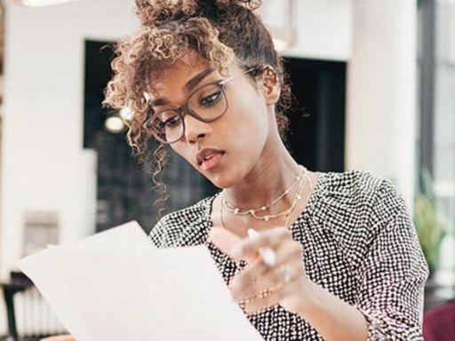 Young lawyer working on corporate law documents