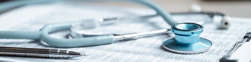 Close up of stethoscope on top of a clipboard