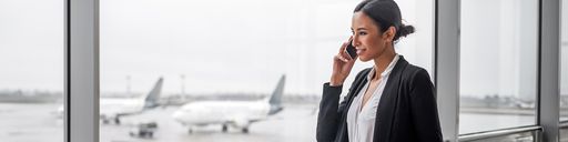 Woman talking on her cellphone at the airport