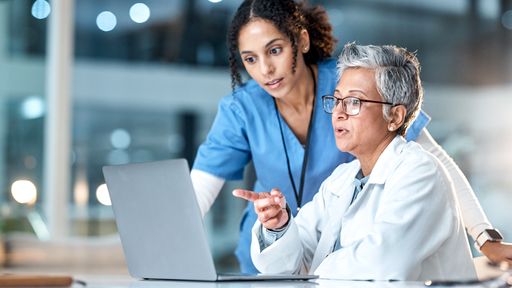 Nurse working with a physician
