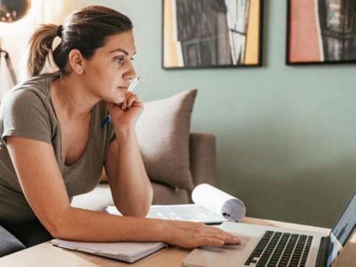 Student working on laptop from home