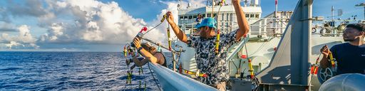 UMassD PhD student Siddhant Kerhalkar (center) and UMassD alumnus FIilipe Pereira (right)  Photo by: San Nguyen, Scripps Institution of Oceanography