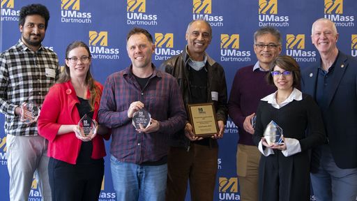 Faculty standing with their well-deserved research awards