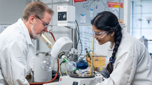Professor and student conducting chemistry research