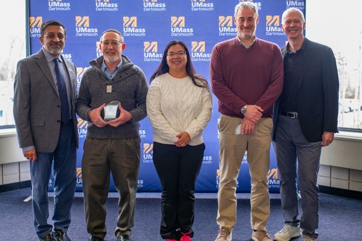 Dr. Mark Altabet, Dr. Kathryn Wassel, and Dr. Patrick Cappillino pictured after receiving the Resilient Future Award, joined by Dr. Ramprasad Balasubramanian and Chancellor Mark Fuller.