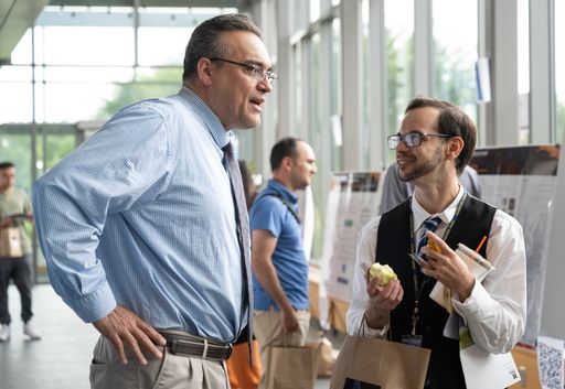 Prof. Paul Gendron was talking to a graduate student during the lunch break.