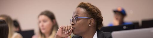 Female student listening in class