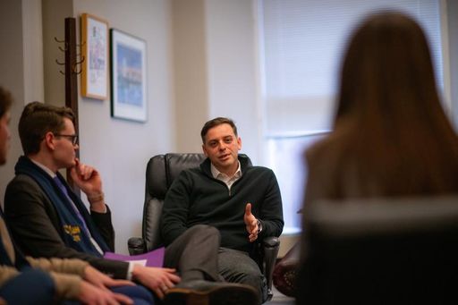 UMass Law students meeting with Louis Tompros, chair of the EJC